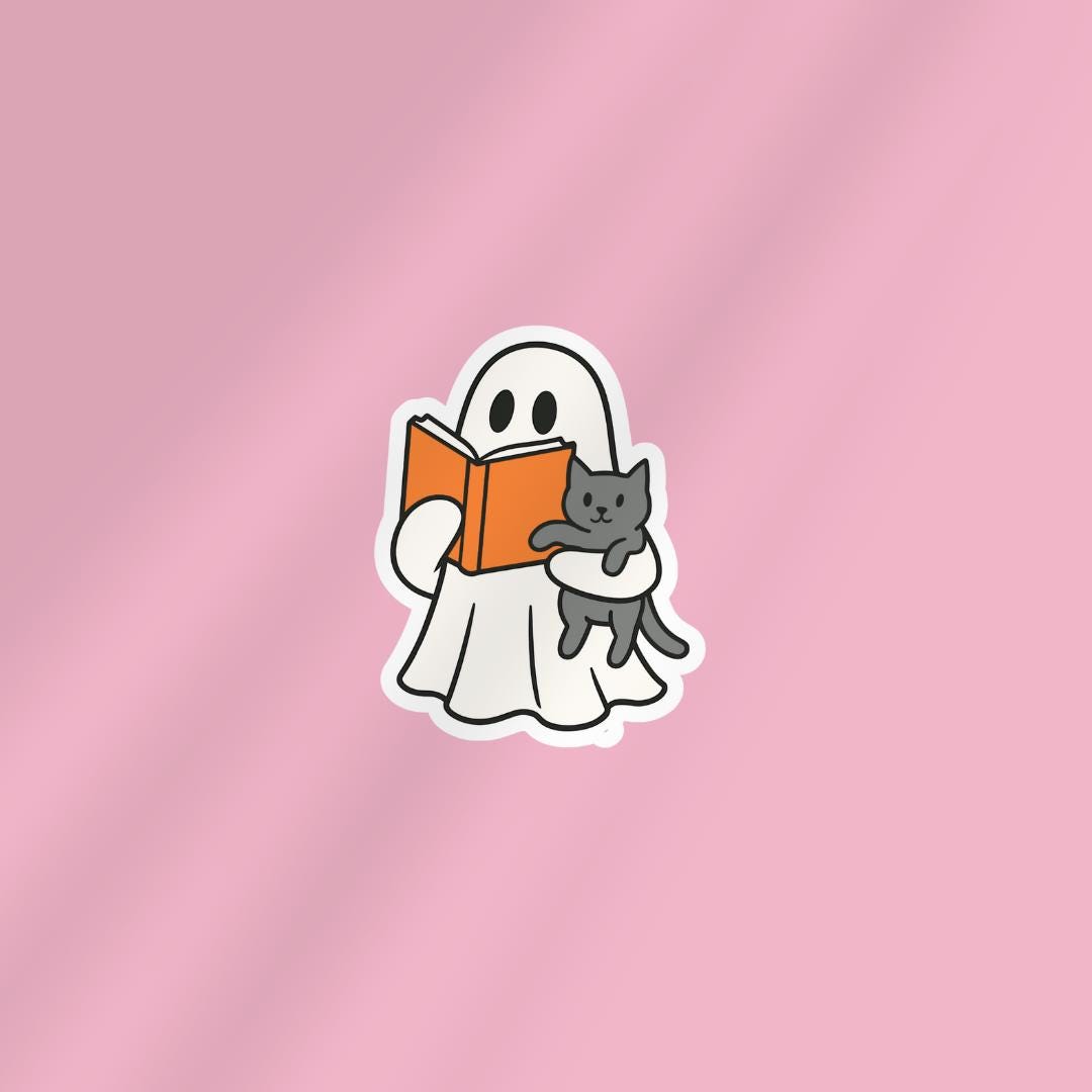 Bookish Ghost Holding Cat Kindle Sticker: Halloween Sticker sticker by Magic & Meaning
