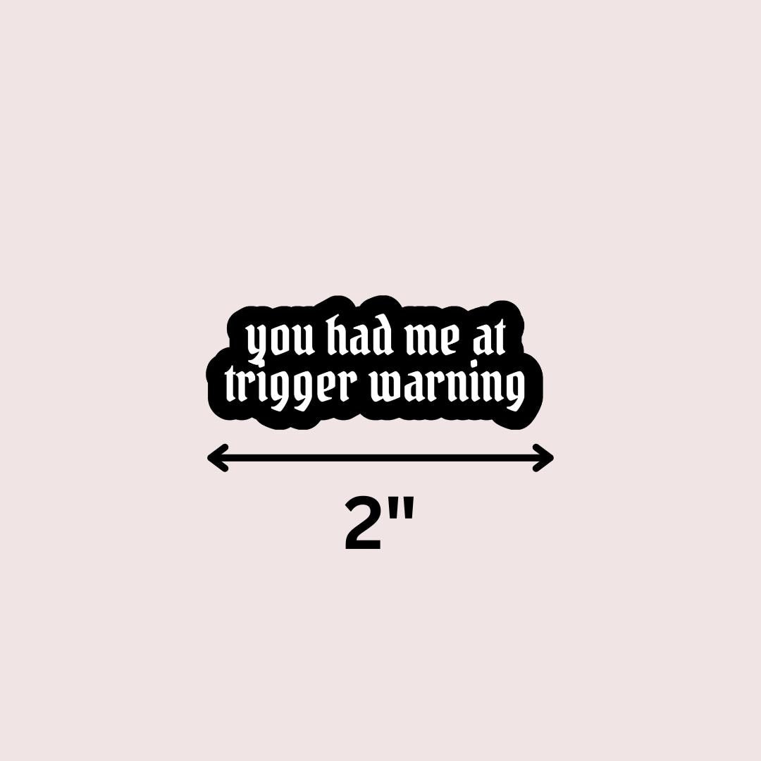 You Had Me At Trigger Warning Bookish Sticker: Romantasy Kindle, Laptop Decal sticker by Magic & Meaning