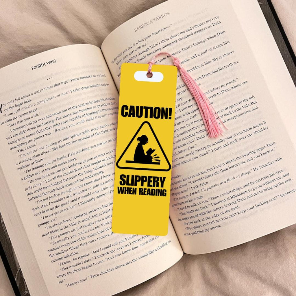 Caution Slippery When Reading Bookmark: Smutty bookmark by Magic & Meaning