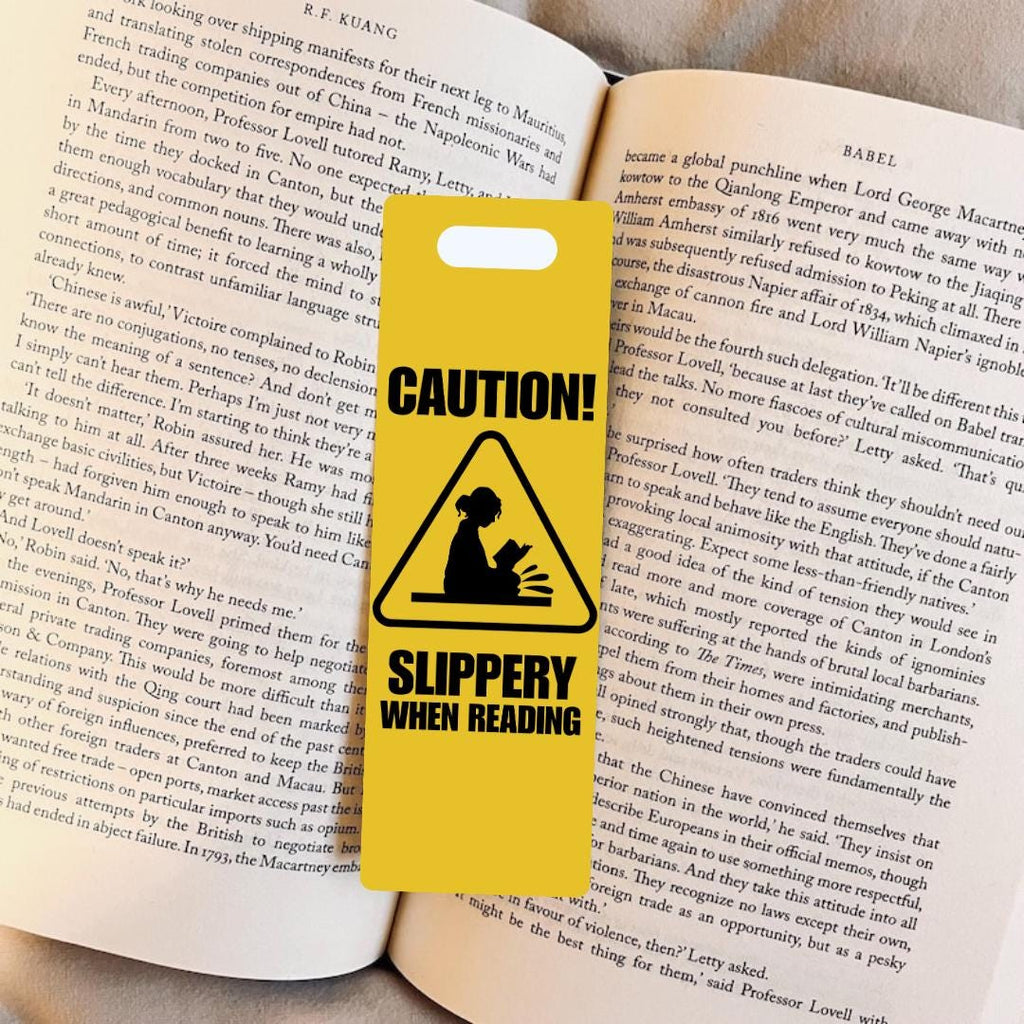 Caution Slippery When Reading Bookmark: Smutty bookmark by Magic & Meaning