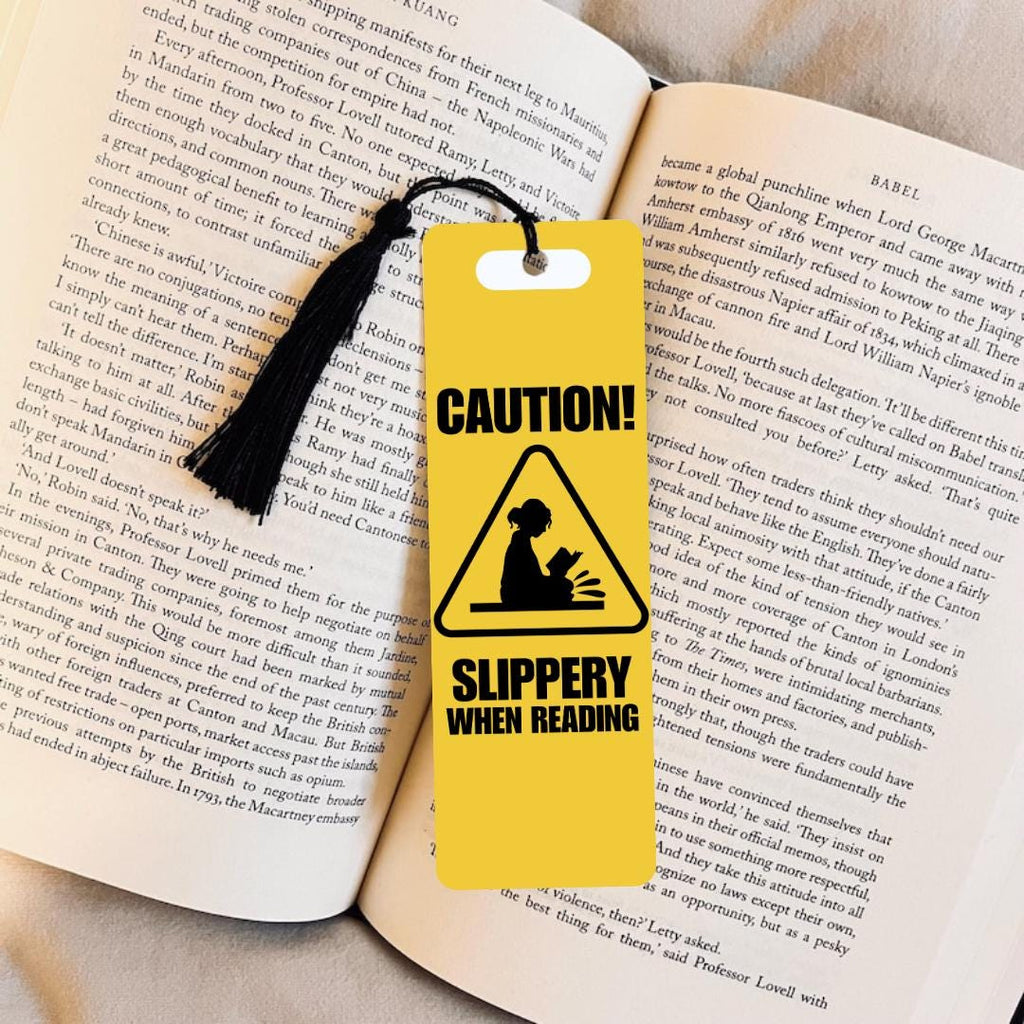 Caution Slippery When Reading Bookmark: Smutty bookmark by Magic & Meaning